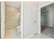 Bathroom features tiled shower with glass door, toilet, and vanity at 11416 Alachua Creek Ln, Riverview, FL 33579