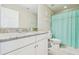 Clean bathroom with granite countertop, white vanity, and neutral walls at 11416 Alachua Creek Ln, Riverview, FL 33579