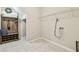 Functional laundry room featuring a built-in bench and cubbies at 11416 Alachua Creek Ln, Riverview, FL 33579