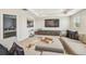 Upstairs bonus room with comfortable sectional and modern decor at 11416 Alachua Creek Ln, Riverview, FL 33579