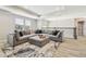 Upstairs loft with a sectional couch and an outside view at 11416 Alachua Creek Ln, Riverview, FL 33579
