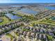 Expansive aerial view of a large community surrounded by several lakes and ponds at 11525 Scarlet Ibis Pl, Riverview, FL 33569