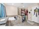 Bathroom featuring a tub-shower combo, tiled walls, granite countertops, and ample storage at 11525 Scarlet Ibis Pl, Riverview, FL 33569