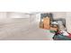 A spacious bonus room with neutral carpet, perfect for relaxing or entertaining at 11525 Scarlet Ibis Pl, Riverview, FL 33569