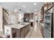 Well-equipped kitchen with an island, stainless steel appliances, and plenty of counter space for meal prep at 11525 Scarlet Ibis Pl, Riverview, FL 33569