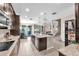 Stylish kitchen featuring an island, stainless steel appliances, and an open layout perfect for entertaining at 11525 Scarlet Ibis Pl, Riverview, FL 33569