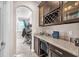 Convenient built-in desk area with cabinets, offering a functional workspace within the home at 11525 Scarlet Ibis Pl, Riverview, FL 33569