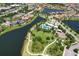 An aerial view of the community showcasing the homes, lakes, walking paths and amenities at 11909 Climbing Fern Ave, Riverview, FL 33579