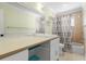 Bathroom featuring a vanity, sink, mirror, and a shower with a curtain at 1227 Tuxford Dr, Brandon, FL 33511
