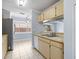 Kitchen featuring stainless steel refrigerator, dishwasher and a view into the dining area at 1227 Tuxford Dr, Brandon, FL 33511