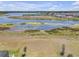 Scenic lake view property, showcasing natural beauty and community living at 12572 Bergstrom Bay Dr, Riverview, FL 33579