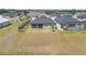 View of house with spacious backyard and no rear neighbors and a fence at 12572 Bergstrom Bay Dr, Riverview, FL 33579