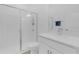 Modern bathroom showcasing a sleek glass shower, toilet, and vanity with a countertop at 12572 Bergstrom Bay Dr, Riverview, FL 33579