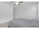 Spacious bedroom with a comfortable bed, soft lighting, and ample closet space for storage at 12572 Bergstrom Bay Dr, Riverview, FL 33579