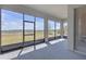 The lanai offers peaceful views of the backyard, pond, and natural landscape at 12572 Bergstrom Bay Dr, Riverview, FL 33579