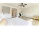 Bright main bedroom with natural light and an open layout with seating area at 13071 Willow Grove Dr, Riverview, FL 33579