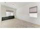 Neutral bedroom featuring plush carpet, two windows, and ample natural light at 13071 Willow Grove Dr, Riverview, FL 33579