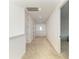 Bright hallway with neutral carpet, recessed lighting, and crisp white walls at 13071 Willow Grove Dr, Riverview, FL 33579
