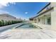 Backyard featuring pool, patio, manicured landscaping, and privacy fence at 13071 Willow Grove Dr, Riverview, FL 33579