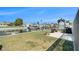 Waterfront backyard with lawn and patio area offers boat dock access at 13401 Neptune Dr, Hudson, FL 34667