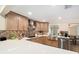 Updated kitchen with stainless steel appliances, stylish backsplash, and custom cabinetry at 13401 Neptune Dr, Hudson, FL 34667