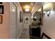 Inviting foyer with a wood ceiling, decorative mirror, and elegant furnishings at 1430 Normandy Park Oaks Dr # 9, Clearwater, FL 33756