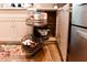 Convenient kitchen with lazy susan cabinet, stainless steel refrigerator and lots of storage at 1430 Normandy Park Oaks Dr # 9, Clearwater, FL 33756