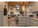 Open concept living room and kitchen area with hardwood floors and wood ceilings at 1430 Normandy Park Oaks Dr # 9, Clearwater, FL 33756