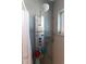 Modern shower with gray decorative tile, window, and rainfall shower head fixture at 1430 Normandy Park Oaks Dr # 9, Clearwater, FL 33756