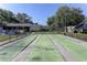 Outdoor shuffleboard courts perfect for community fun in a lush and inviting setting at 1430 Normandy Park Oaks Dr # 9, Clearwater, FL 33756
