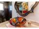 The bathroom has an eye-catching vessel sink with a colorful and artistic design at 1430 Normandy Park Oaks Dr # 9, Clearwater, FL 33756