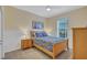Comfortable bedroom featuring ceiling fan, carpet floors, lots of natural light and modern decor at 14727 Tudor Chase Dr, Tampa, FL 33626