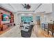 Large living room featuring an open floor plan with access to the pool at 14727 Tudor Chase Dr, Tampa, FL 33626