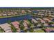 An aerial view showcases a serene lake community with well-maintained homes and lush greenery at 16139 Coquina Bay Ln, Wimauma, FL 33598