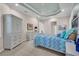 Spacious primary bedroom with tray ceiling, neutral walls, and carpeted floor at 16139 Coquina Bay Ln, Wimauma, FL 33598