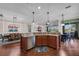 Gourmet kitchen featuring granite countertops, stainless steel appliances and decorative lighting at 16139 Coquina Bay Ln, Wimauma, FL 33598