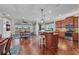 Inviting kitchen island flows into a spacious living area, perfect for entertaining and relaxation at 16139 Coquina Bay Ln, Wimauma, FL 33598