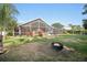 Spacious, fully screened lanai and lush backyard offer a private retreat for relaxation and outdoor enjoyment at 16910 Equestrian Trl, Odessa, FL 33556