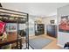 This bedroom features a loft bed and playful decor, perfect for a space at 16910 Equestrian Trl, Odessa, FL 33556