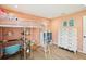 Bedroom boasting a loft bed, wood floor, and light peach walls with a white dresser at 16910 Equestrian Trl, Odessa, FL 33556