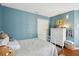 This bedroom has a bed, a dresser, and a closet with a Harry Potter theme at 16910 Equestrian Trl, Odessa, FL 33556