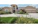 Charming home with a manicured lawn, concrete driveway, and tasteful landscaping in front at 16910 Equestrian Trl, Odessa, FL 33556