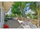 The back deck features outdoor seating, lush greenery, and a comfortable hammock at 1735 Maryland Ne Ave, St Petersburg, FL 33703