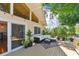 Relaxing outdoor deck with comfortable seating, lush greenery, and a peaceful ambiance at 1735 Maryland Ne Ave, St Petersburg, FL 33703