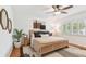 Cozy bedroom with natural light, stylish decor, and a calming atmosphere at 1735 Maryland Ne Ave, St Petersburg, FL 33703