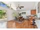 Sun-filled dining room with a vaulted ceiling, hardwood floors, and sliding door to outdoor patio at 1735 Maryland Ne Ave, St Petersburg, FL 33703