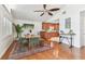 Cozy dining room featuring wood floors, vaulted ceiling, and an open plan to the kitchen at 1735 Maryland Ne Ave, St Petersburg, FL 33703