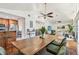Open-concept living and dining area features vaulted ceilings and wood floors at 1735 Maryland Ne Ave, St Petersburg, FL 33703