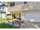 Close-up of the home's entrance, showcasing a landscaped garden and well-lit front porch at 1735 Maryland Ne Ave, St Petersburg, FL 33703