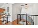 Hallway with view of the stairs and easy access to the kitchen and dining area at 1735 Maryland Ne Ave, St Petersburg, FL 33703